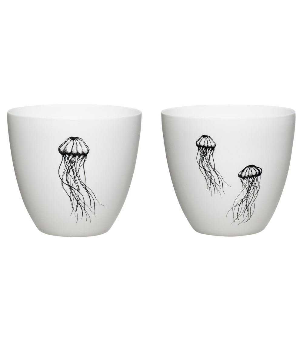 Vue avant de deux photophores en porcelaine avec impression méduse.